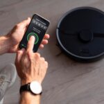 man operating a smart device