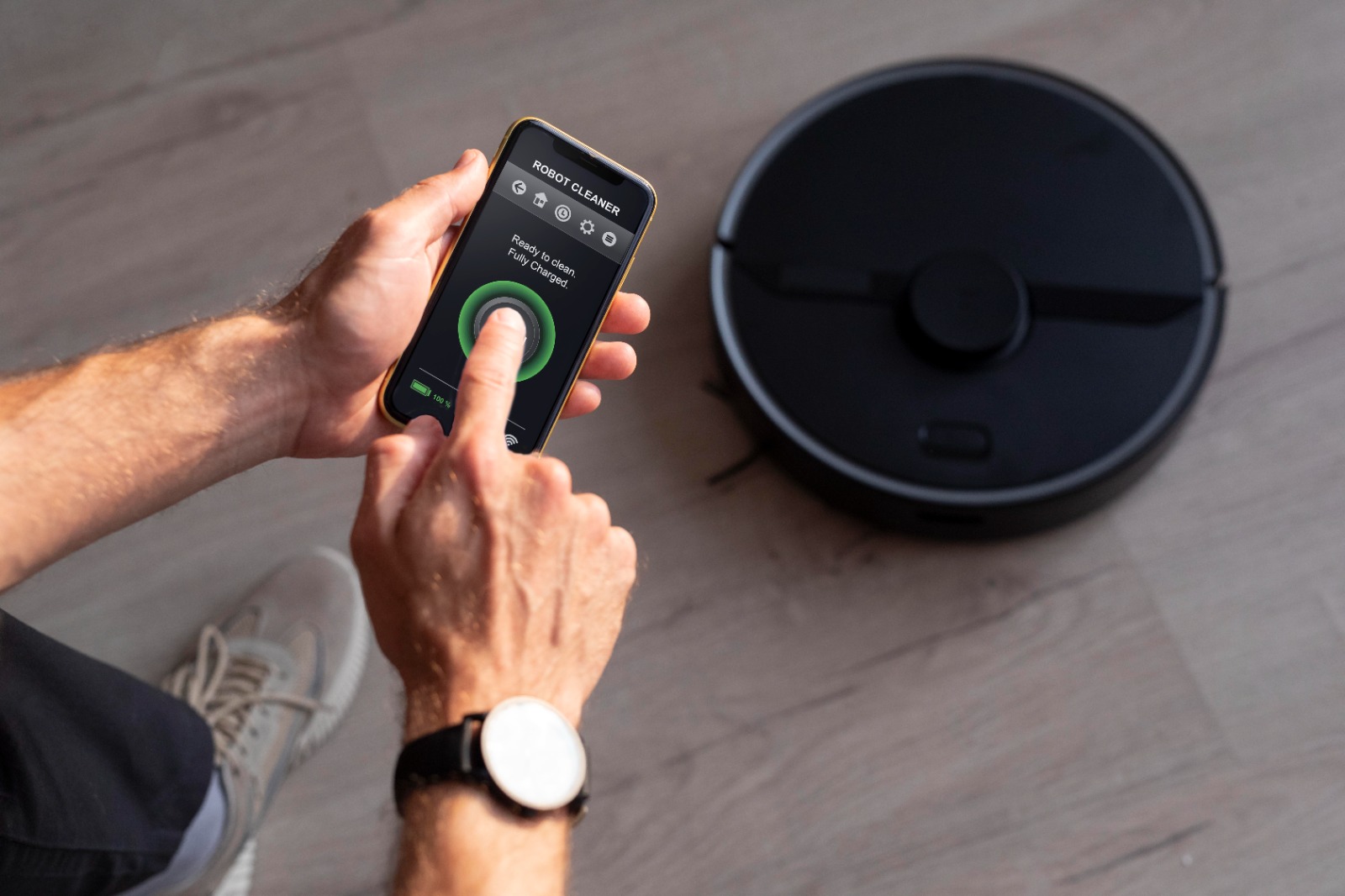 man operating a smart device